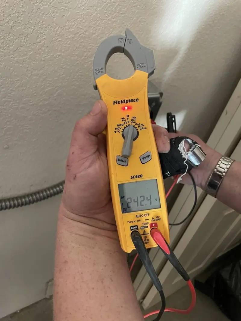 Voltage testing with clamp meter during Electrical Installation Services in Mount Dora